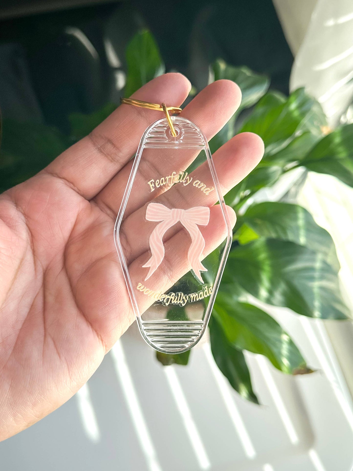 Fearfully and wonderfully made acrylic keychain: Clear